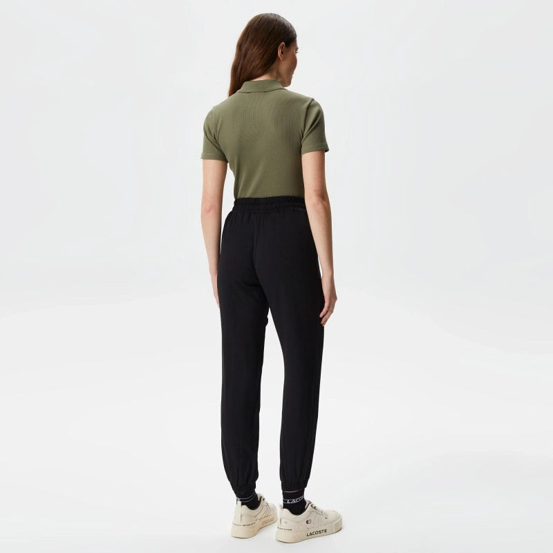 Женские брюки Lacoste