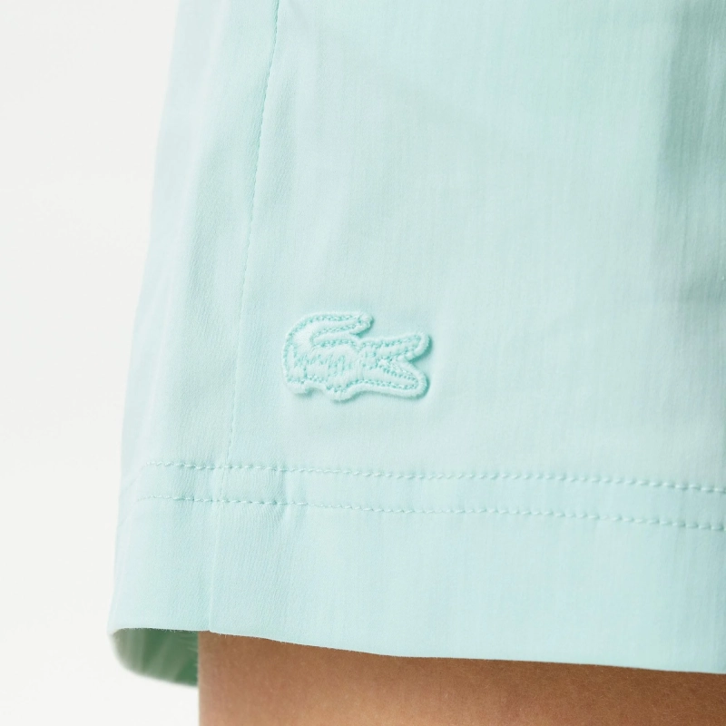 Женские бермуды Lacoste